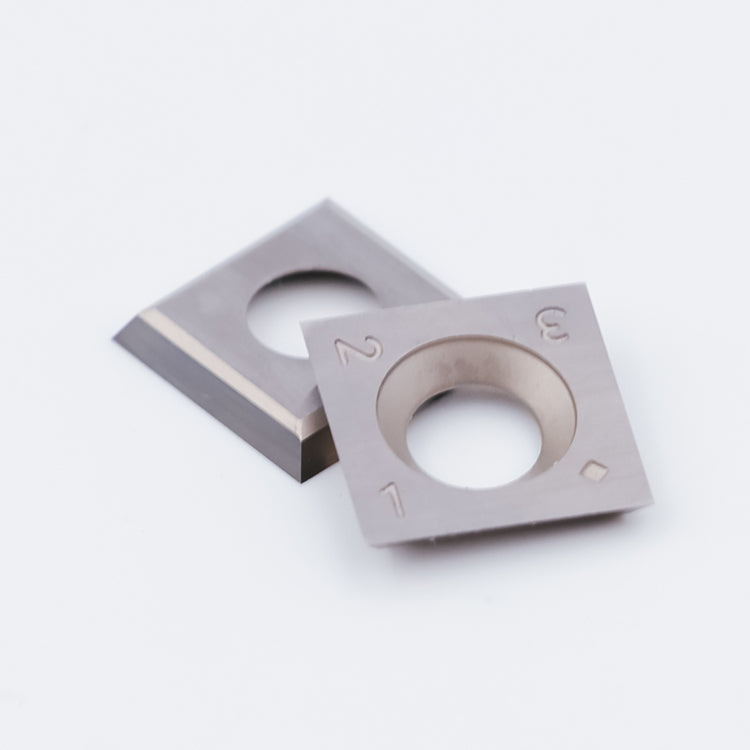 Reversible carbide inserts